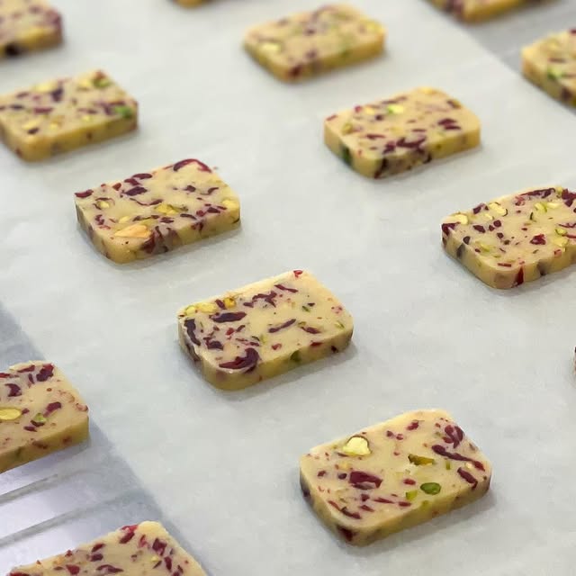 Cranberry pistachio slice, fresh out of the tray