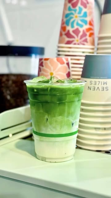 Iced matcha latte, Seven Miles cups in the background